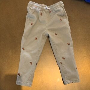 Football-print khaki pants